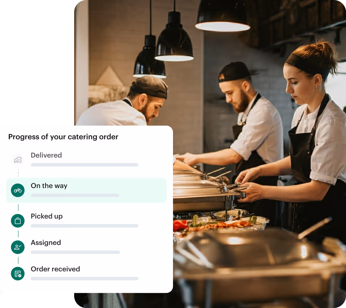Kitchen staff preparing a catering order with its delivery progress in Shipday